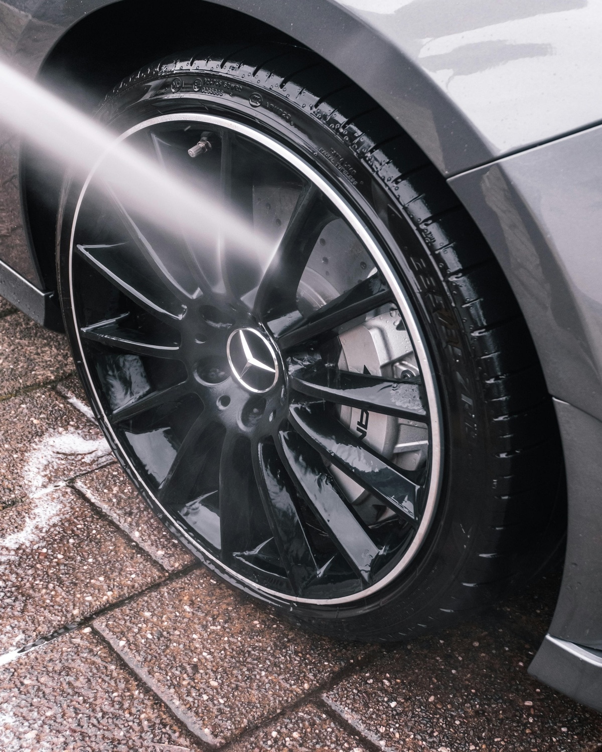 Mercedes AMG wheel being detailed